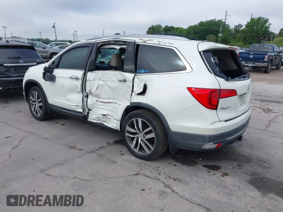 2016 Honda Pilot Elite with VIN 5FNYF6H00GB104329, listed as a IAAI auction lot 41905390 with 125,501 mi miles. Bid and sale history available at carsss.com. Image 3.
