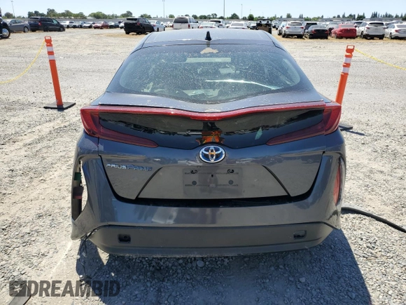 2021 Toyota Prius LE z VIN JTDKAMFPXM3190346, wystawiony jako Copart lot #57626675 z przebiegiem 102 786 mil mil oraz Szkoda całkowita • Salvage title. Historia ofert i sprzedaży dostępna na DreamBid. Obrazek 6.