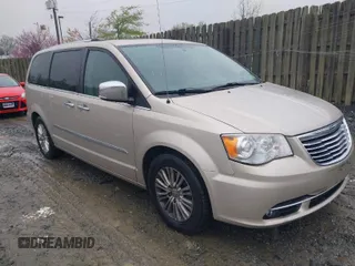 2013 Chrysler Town & Country Limited with VIN 2C4RC1GG2DR536256, listed as a IAAI auction lot 42027427 with 126,447 mi miles. Bid and sale history available at carsss.com. Image 1.