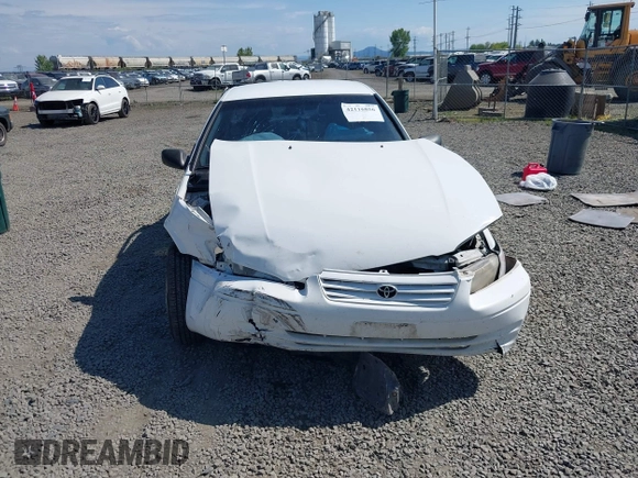 1999 Toyota Camry LE z VIN 4T1BG22K0XU862535, wystawiony jako IAAI lot #42116856 z przebiegiem 186 094 mil mil oraz . Historia ofert i sprzedaży dostępna na DreamBid. Obrazek 13.