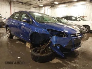2013 Ford Focus SE z VIN 1FADP3F2XDL124732, wystawiony jako IAAI lot #41510140 z przebiegiem 69 819 mil mil oraz . Historia ofert i sprzedaży dostępna na DreamBid. Obrazek 1.