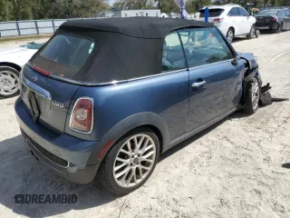 2010 MINI Convertible S z VIN WMWMS3C55ATY09138, wystawiony jako Copart lot #49045585 z przebiegiem 74 728 mil mil oraz Szkoda całkowita • Salvage title. Historia ofert i sprzedaży dostępna na DreamBid. Obrazek 3.