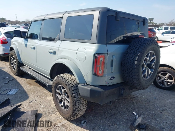 2023 Ford Bronco z VIN 1FMDE5BH5PLB37801, wystawiony jako IAAI lot #41691282 z przebiegiem 21 129 mil mil oraz . Historia ofert i sprzedaży dostępna na DreamBid. Obrazek 3.