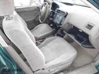 1999 Honda Civic VP with VIN 2HGEJ6618XH579736, listed as a IAAI auction lot 41912296 with 268,631 mi miles. Bid and sale history available at carsss.com. Image 5.