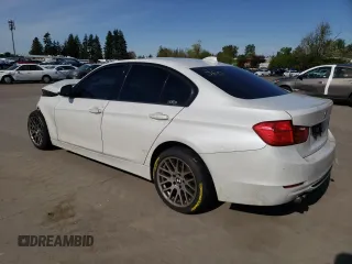 2012 BMW 3 Series 328i with VIN WBA3C1C5XCA696847, listed as a Copart auction lot 53005425 with 143,725 mi miles and Salvage title. Bid and sale history available at DreamBid. Image 2.