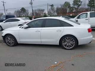 2013 Audi A6 Premium Plus with VIN WAUGFAFC6DN051237, listed as a IAAI auction lot 41553452 with 114,446 mi miles and . Bid and sale history available at DreamBid. Image 15.