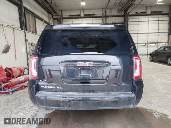 2018 GMC Yukon XL SLT with VIN 1GKS2GKC5JR346324, listed as a IAAI auction lot 41580164 with 123,640 mi miles. Bid and sale history available at carsss.com. Image 16.