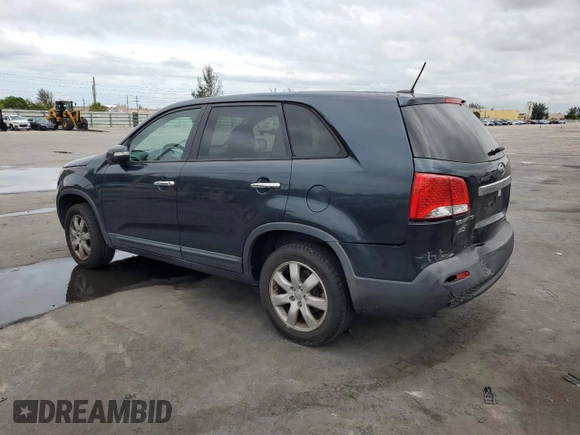 2012 Kia Sorento LX z VIN 5XYKT3A17CG274495, wystawiony jako Copart lot #56321925 z przebiegiem 130 439 mil mil oraz Szkoda całkowita • Salvage title. Historia ofert i sprzedaży dostępna na DreamBid. Obrazek 2.