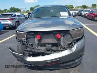 2013 Dodge Durango SXT with VIN 1C4RDHAGXDC500144, listed as a IAAI auction lot 42693122 with 194,519 mi miles and . Bid and sale history available at DreamBid. Image 6.