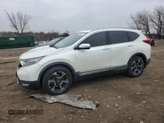 2018 Honda CR-V Touring with VIN 2HKRW2H98JH695059, listed as a Copart auction lot 86452054 with 114,437 mi miles and Salvage Title. Bid and sale history available at DreamBid. Image 1.