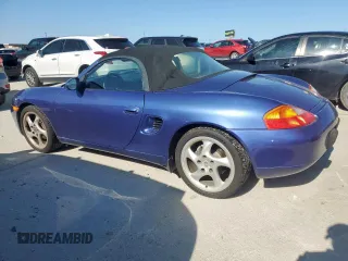 1999 Porsche Boxster z VIN WP0CA2980XU629582, wystawiony jako Copart lot #57534035 z przebiegiem 190 873 mil mil oraz Czysty tytuł • Clean title. Historia ofert i sprzedaży dostępna na DreamBid. Obrazek 2.