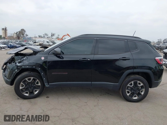 2018 Jeep Compass Trailhawk with VIN 3C4NJDDB3JT451658, listed as a IAAI auction lot 42087588 with 90,189 mi miles and . Bid and sale history available at DreamBid. Image 14.