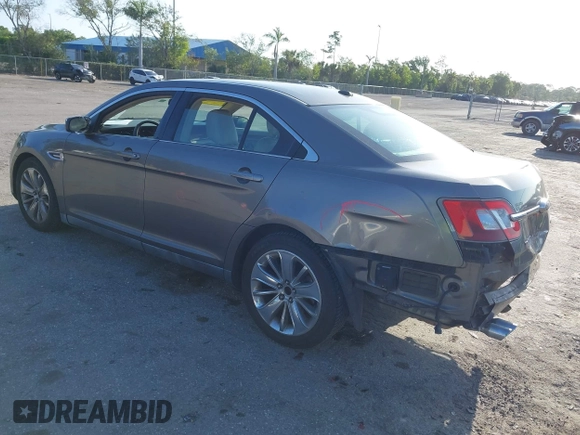 2011 Ford Taurus Limited with VIN 1FAHP2FW3BG117688, listed as a IAAI auction lot 41974469 with 215,036 mi miles and . Bid and sale history available at carsss.com. Image 3.