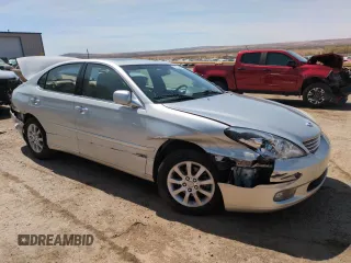 2002 Lexus ES 300 with VIN JTHBF30G725034964, listed as a Copart auction lot 51224395 with 100,097 mi miles and Salvage Title. Bid and sale history available at DreamBid. Image 4.