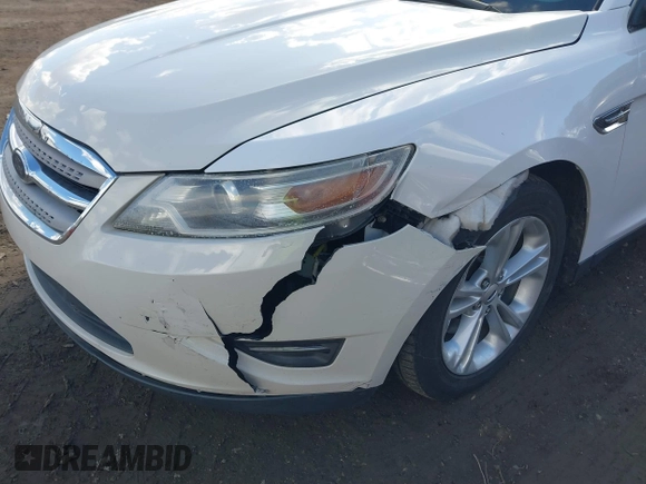 2014 Ford Taurus SEL with VIN 1FAHP2E88EG127074, listed as a IAAI auction lot 41688975 with 186,650 mi miles. Bid and sale history available at carsss.com. Image 6.