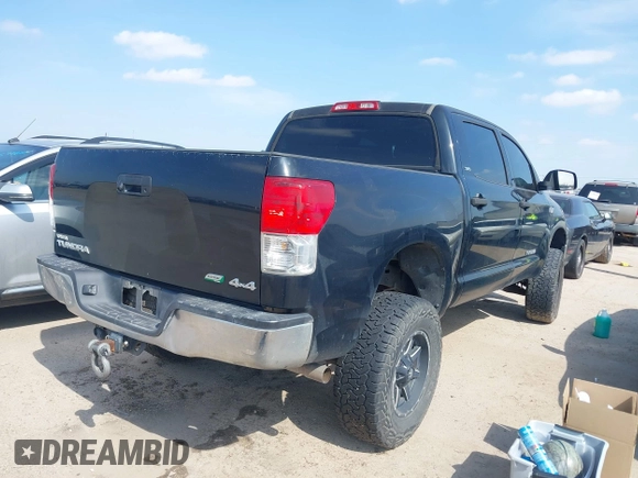 2013 Toyota Tundra 4WD Truck with VIN 5TFDW5F16DX286995, listed as a IAAI auction lot 41584571 with 118,651 mi miles. Bid and sale history available at carsss.com. Image 4.