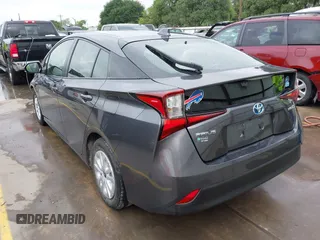 2022 Toyota Prius L Eco with VIN JTDKAMFU4N3183352, listed as a IAAI auction lot 42170623 with 52,244 mi miles and . Bid and sale history available at DreamBid. Image 3.