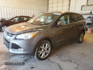 2013 Ford Escape SEL with VIN 1FMCU9H98DUD25689, listed as a Copart auction lot 52017295 with 101,064 mi miles and Salvage Title. Bid and sale history available at DreamBid. Image 1.