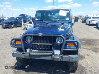 2001 Jeep Wrangler SE with VIN 1J4FA29P01P344644, listed as a IAAI auction lot 42170936 with 130,938 mi miles and . Bid and sale history available at DreamBid. Image 12.