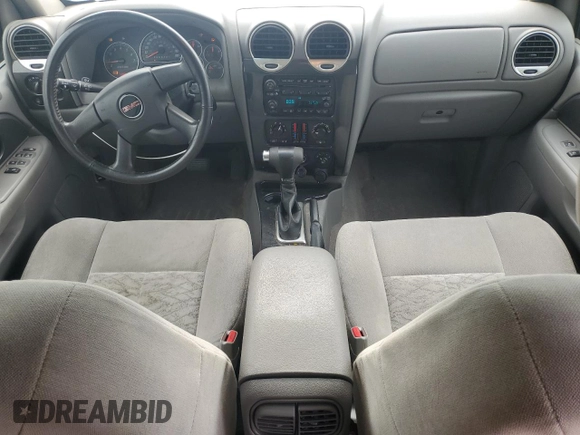 2007 GMC Envoy SLE z VIN 1GKDT13S272124785, wystawiony jako Copart lot #56509515 z przebiegiem 111 960 mil mil oraz Czysty tytuł • Clean title. Historia ofert i sprzedaży dostępna na DreamBid. Obrazek 8.