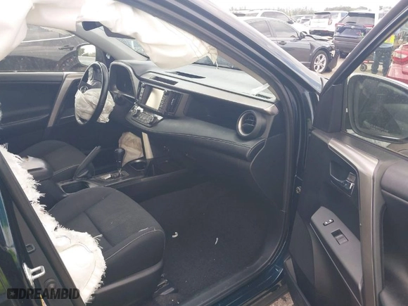 2018 Toyota RAV4 XLE with VIN JTMWFREV8JJ172645, listed as a IAAI auction lot 41734624 with 105,674 mi miles. Bid and sale history available at carsss.com. Image 3.