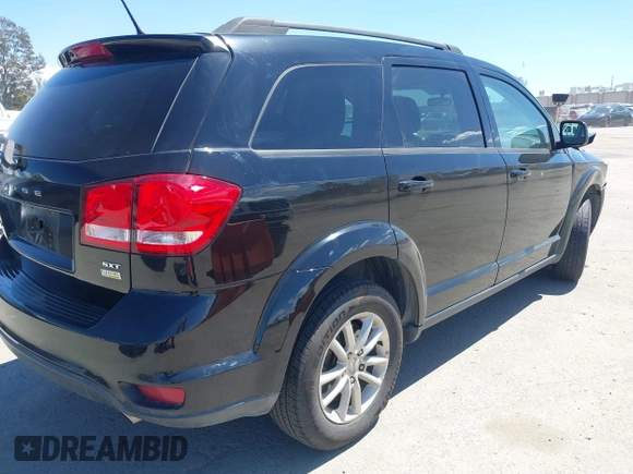 2017 Dodge Journey SXT with VIN 3C4PDCBG7HT518586, listed as a IAAI auction lot 41939533 with 128,154 mi miles and . Bid and sale history available at DreamBid. Image 4.