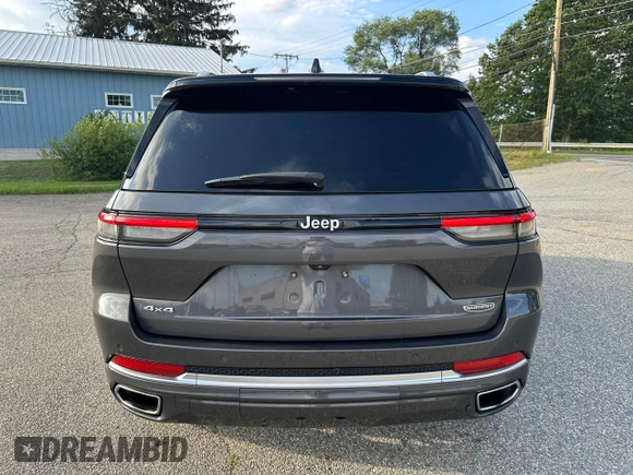 2023 Jeep Grand Cherokee Summit with VIN 1C4RJHEG2P8882566, listed as a Copart auction lot 65095905 with 59,970 mi miles and Salvage title. Bid and sale history available at DreamBid. Image 15.
