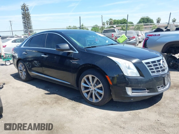 2013 Cadillac XTS Luxury z VIN 2G61R5S32D9226506, wystawiony jako IAAI lot #42208105 z przebiegiem 140 255 mil mil oraz . Historia ofert i sprzedaży dostępna na DreamBid. Obrazek 13.