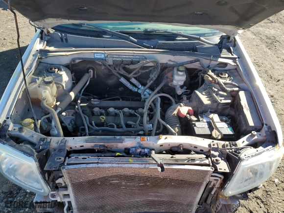 2010 Mazda Tribute Sport with VIN 4F2CY9C7XAKM03394, listed as a Copart auction lot 47975075 with 145,286 mi miles and Salvage Title. Bid and sale history available at carsss.com. Image 14.
