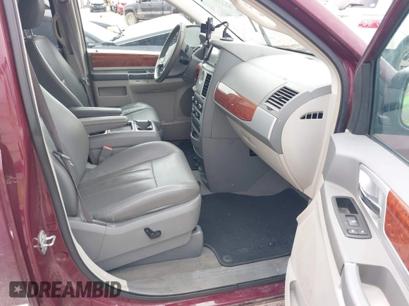 2009 Chrysler Town & Country Touring with VIN 2A8HR54169R618640, listed as a IAAI auction lot 42210905 with 227,420 mi miles and . Bid and sale history available at DreamBid. Image 5.