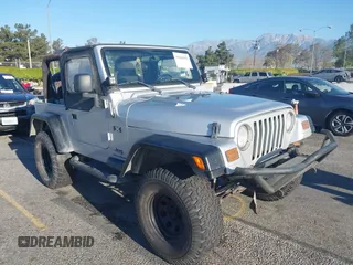2005 Jeep Wrangler X with VIN 1J4FA39S55P348432, listed as a IAAI auction lot 41868451 with 166,876 mi miles. Bid and sale history available at carsss.com. Image 1.