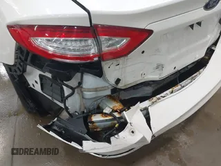 2014 Ford Fusion SE with VIN 1FA6P0H73E5351587, listed as a IAAI auction lot 42140071 with 108,524 mi miles and . Bid and sale history available at DreamBid. Image 6.