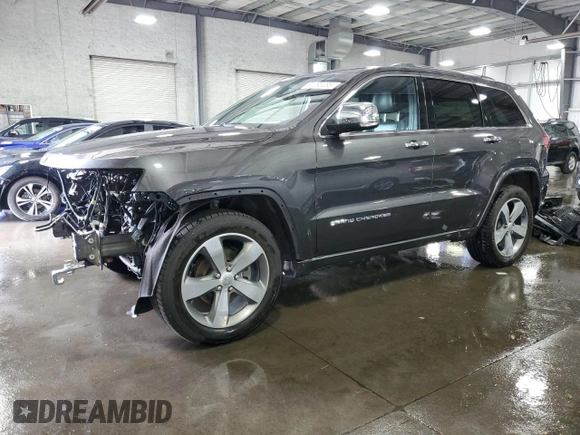 2016 Jeep Grand Cherokee Overland with VIN 1C4RJFCG9GC345309, listed as a Copart auction lot 61095285 with 115,968 mi miles and Salvage title. Bid and sale history available at DreamBid. Image 1.