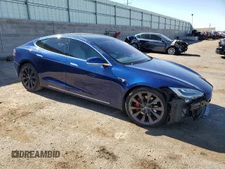 2019 Tesla Model S 100D with VIN 5YJSA1E40KF332077, listed as a Copart auction lot 53733965 with 33,098 mi miles and Salvage title. Bid and sale history available at DreamBid. Image 4.
