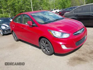 2012 Hyundai Accent GLS with VIN KMHCU4AE3CU210782, listed as a IAAI auction lot 42159648 with 113,327 mi miles. Bid and sale history available at carsss.com. Image 1.