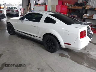 2007 Ford Mustang Deluxe with VIN 1ZVFT80N575259508, listed as a IAAI auction lot 41569259 with 164,315 mi miles. Bid and sale history available at carsss.com. Image 3.