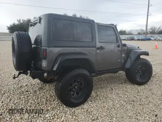 2017 Jeep Wrangler Willys Wheeler with VIN 1C4AJWAG9HL673766, listed as a Copart auction lot 43132555 with 129,422 mi miles and Salvage Title. Bid and sale history available at DreamBid. Image 3.