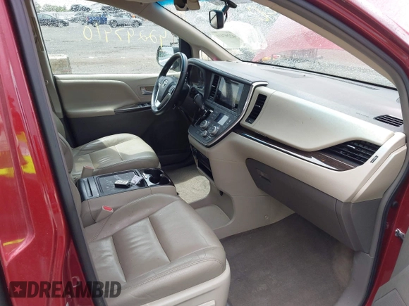 2015 Toyota Sienna XLE with VIN 5TDYK3DC9FS569714, listed as a IAAI auction lot 42297410 with 114,802 mi miles and . Bid and sale history available at DreamBid. Image 5.