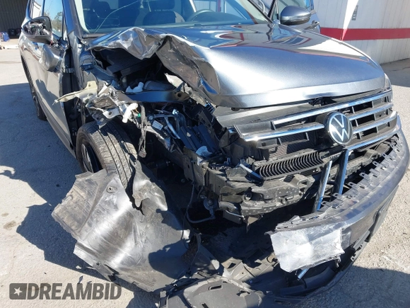 2022 Volkswagen Tiguan S with VIN 3VV1B7AX9NM055507, listed as a IAAI auction lot 41383597 with 25,546 mi miles and . Bid and sale history available at DreamBid. Image 6.