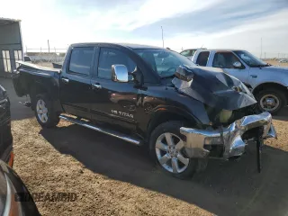 2013 Nissan Titan SV with VIN 1N6AA0EC1DN310572, listed as a Copart auction lot 50017235 with 114,349 mi miles and Salvage title. Bid and sale history available at DreamBid. Image 4.