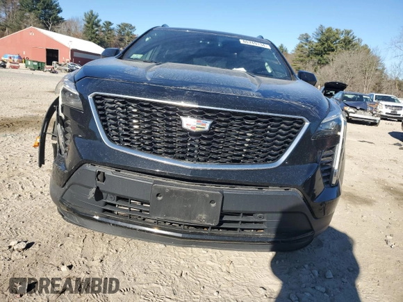 2019 Cadillac XT4 AWD Sport with VIN 1GYFZFR48KF100558, listed as a Copart auction lot 80749134 with 61,389 mi miles and Salvage title. Bid and sale history available at DreamBid. Image 5.
