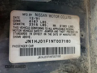 1992 Nissan Maxima z VIN JN1HJ01F1NT007180, wystawiony jako Copart lot #71271334 z przebiegiem 252 299 mil mil oraz Tytuł czysty. Historia ofert i sprzedaży dostępna na DreamBid. Obrazek 12.