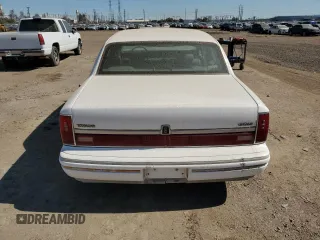 1994 Lincoln Town Car Signature z VIN 1LNLM82W3RY633555, wystawiony jako Copart lot #81430533 z przebiegiem 202 350 mil mil oraz Czysty tytuł • Clean title. Historia ofert i sprzedaży dostępna na DreamBid. Obrazek 6.