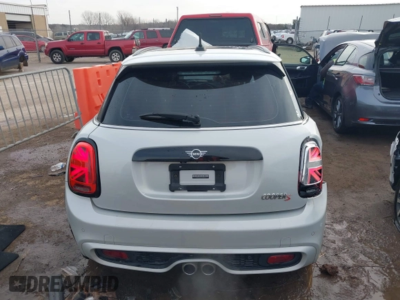 2019 MINI Hardtop 4 Door Cooper S with VIN WMWXU3C59K2H87159, listed as a IAAI auction lot 41225965 with 76,640 mi miles and . Bid and sale history available at DreamBid. Image 16.