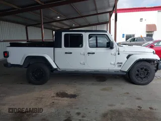 2021 Jeep Gladiator Willys with VIN 1C6HJTAG0ML505674, listed as a IAAI auction lot 42249317 with 60,150 mi miles and . Bid and sale history available at DreamBid. Image 13.