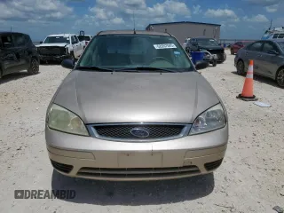 2006 Ford Focus S with VIN 1FAFP34N26W225772, listed as a Copart auction lot 62657045 with 117,078 mi miles and Salvage title. Bid and sale history available at DreamBid. Image 5.