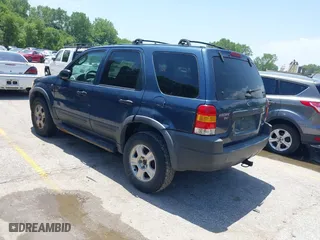 2001 Ford Escape XLT with VIN 1FMCU041X1KF10409, listed as a IAAI auction lot 39780383 with 246,336 mi miles. Bid and sale history available at carsss.com. Image 3.