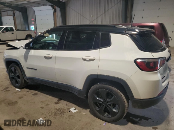 2020 Jeep Compass Latitude with VIN 3C4NJDBB1LT157875, listed as a Copart auction lot 60310155 with 81,817 mi miles and Salvage title. Bid and sale history available at DreamBid. Image 2.