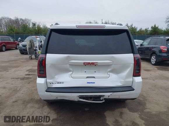 2016 GMC Yukon SLT with VIN 1GKS2BKC5GR374815, listed as a IAAI auction lot 41889495 with 163,464 mi miles. Bid and sale history available at carsss.com. Image 17.