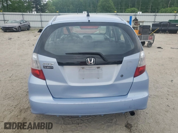 2009 Honda Fit with VIN JHMGE88209S040292, listed as a Copart auction lot 53551595 with 188,494 mi miles and Clean Title. Bid and sale history available at carsss.com. Image 6.